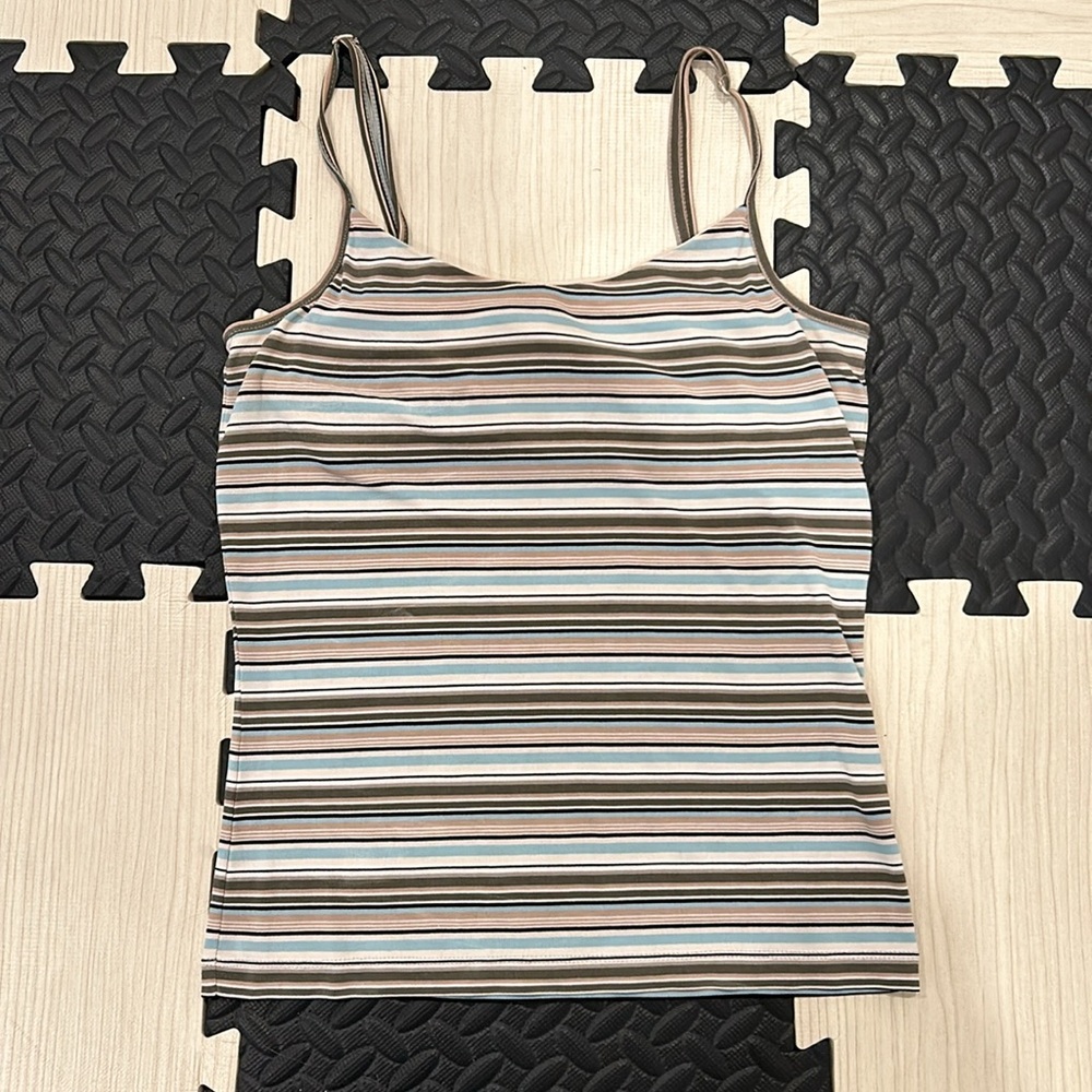 The limited stretch striped tank top in size XS with belts and sports bra